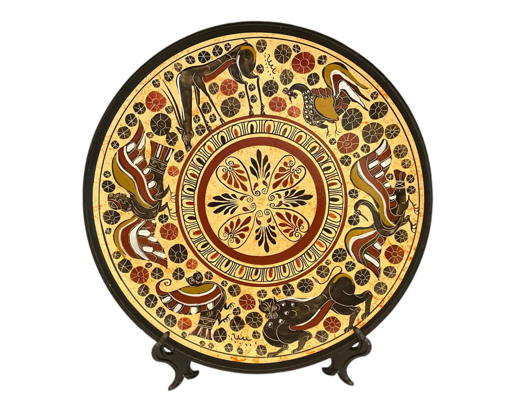 Decorate you wall with a Ceramic Plate with with designs in Cornthian technique .
Corinthian Greek pottery was a prominent style in ancient Greece, flourishing between the 7th and 6th centuries BCE. Known for its detailed, miniature figures, it often featured animals, mythological creatures, and floral patterns. Using a light clay background with black and red decoration, Corinthian pottery played a key role in the development of later Greek ceramic styles, including Attic pottery.
Net weight: 1 kgr(2,2lb