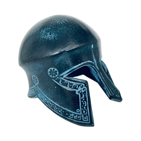 Blue helmet with intricate designs on a white background